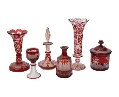 19th century Bohemian red flashed glasswarecomprising a scent and stopper, an engraved spa scent bottle lacking stopper, a li