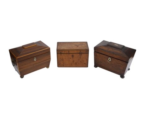 A Regency gonzalo alves tea caddyc.1820of sarcophagus form, inlaid with stringing, the hinged lid with a 18th century style p