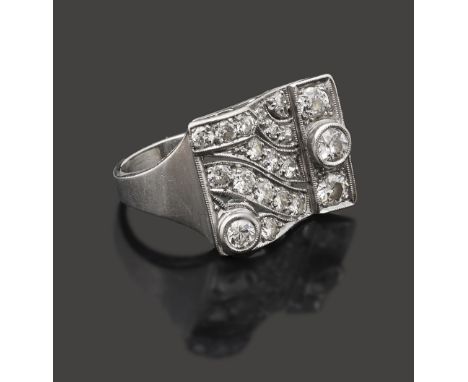 A diamond-set dress ringof rectangular upswept open-work design, set with old brilliant-cut and brilliant-cut diamonds, to th