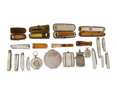 A collection of cheroot holders, silver folding fruit knives and other items comprising assorted amber cheroot holders on wit