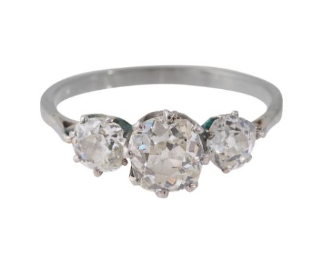 A diamond three stone ring set with graduated cushion-shaped old brilliant-cut diamonds, the central diamond with an approxim