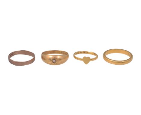 A group of four gold rings22ct gold wedding band, stamped with hallmarks; 22ct gold heart ring, stamped with hallmarks; 18ct 