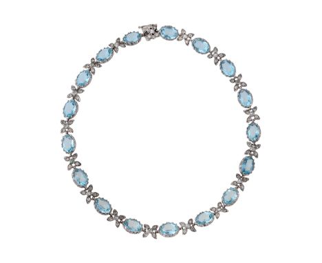 An attractive light blue paste necklaceoval light blue paste within a cut-down setting, separated by floral connectors set wi