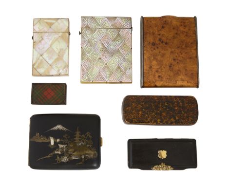 A collection of 19th century snuff boxes and card cases comprising an early 19th century Scottish Mauchline ware sycamore and