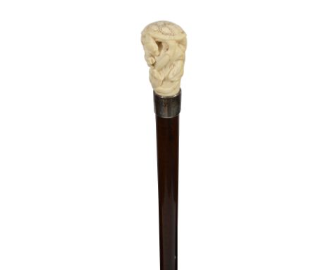 A French novelty walking cane c.1900the Japanese carved ivory pommel in the form of a turtle climbing on a log with frogs and
