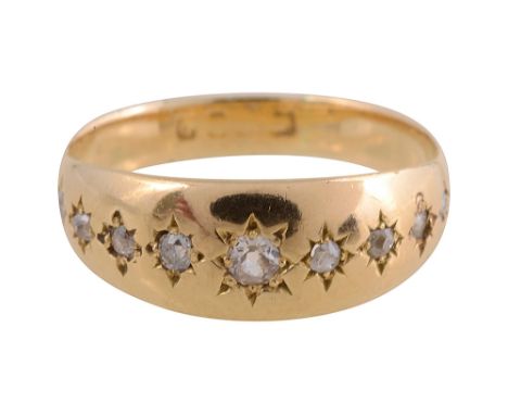 A diamond set gypsy ring set with eight diamonds of graduating size total approx weight 3.8g, ring size NCondition: 