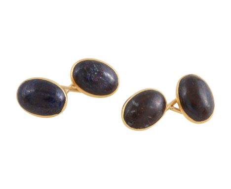 A pair of black opal cufflinksbezel set, with figure-of-eight backs, stamped "18ct"total approx diameter 1.3cm, total approx 