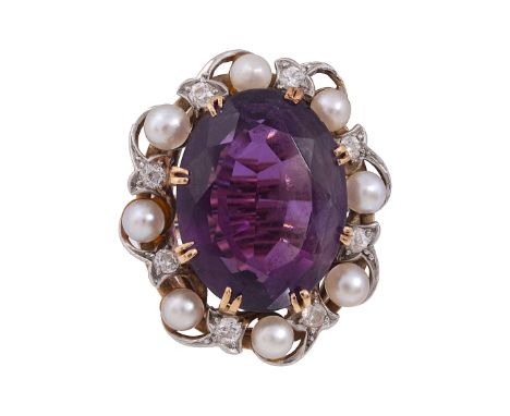 An amethyst, pearl and diamond cluster ringcentral oval mixed-cut amethyst, above a surround of eight pearls and eight diamon