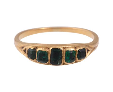 An early 19th century emerald sentimental ringthe five graduated rectangular emeralds closed back collet-set within the yello