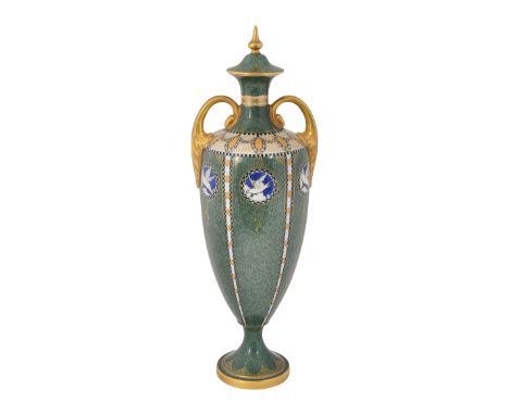 A Royal Worcester porcelain vaselidded and of urn shaped form, with twin gilt scroll handles and decorated on a powder green 