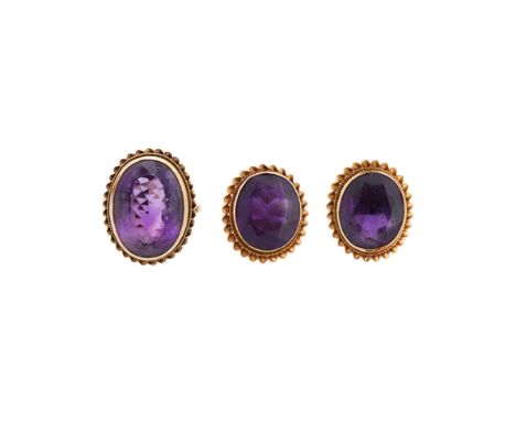 A pair of amethyst and 9ct yellow gold earrings and a matching ringeach collet-set with an oval mixed-cut amethyst to the app