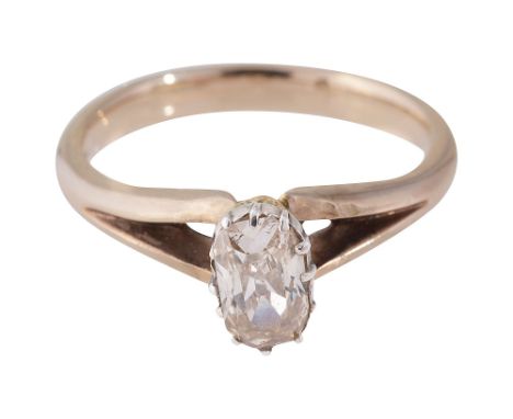 A diamond single stone ring the elongated cushion-shaped old brilliant-cut diamond collet-set above the later 18ct gold bifur