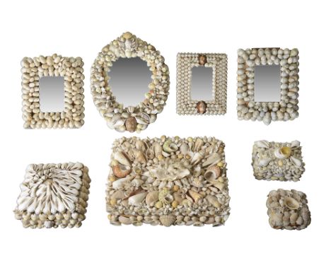 A collection of mid 20th century French shell encrusted itemscomprising a jewellery box, a wall mirror, three easel back rect