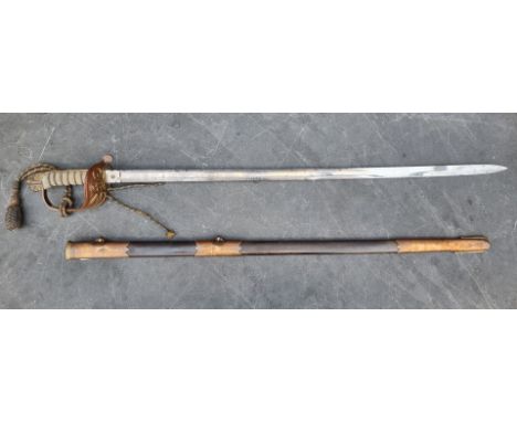 A Victorian Naval officer's sword and scabbard, by Wilkinson Sword, No. 100757, the ricasso marked 'Seagrove &amp; Co. Outfit