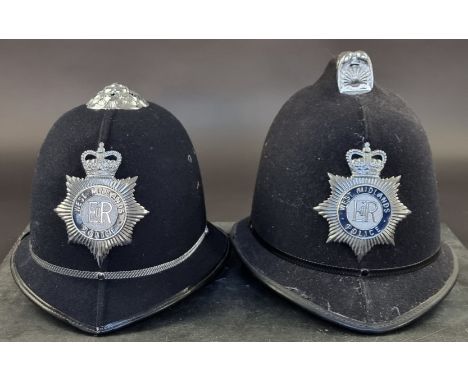 Two West Midlands Police Custodian helmets, one with rose top, the other with comb top. (2)