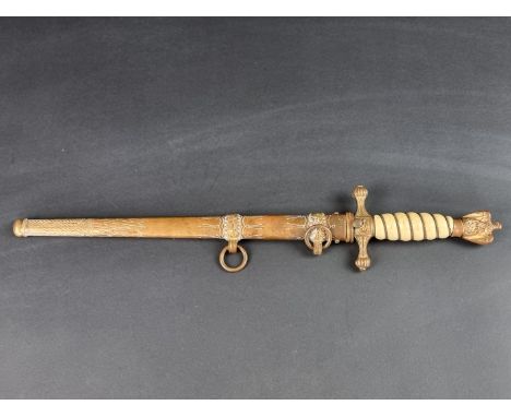 A German Third Reich M1938&nbsp;2nd model naval dagger and scabbard, with unsigned 25cm blade.