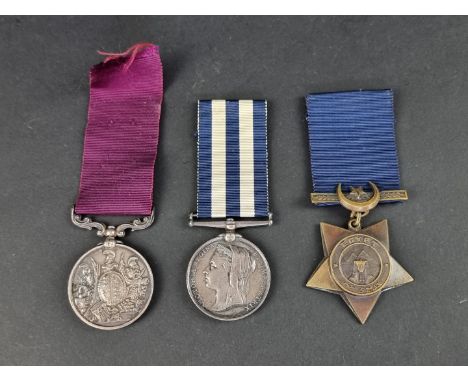 Medals: a group of three medals, comprising: Egypt Medal 1882-89, to: 61 Pte H. Mower, 1 R. W. Kent Regt; an Army Long Servic