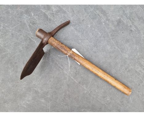 A WWI British army issue entrenching tool, dated 1915.