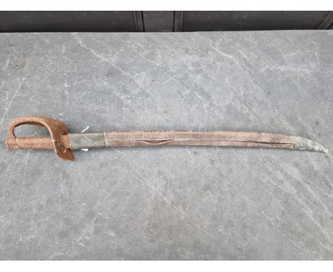 A French M1833 naval cutlass and scabbard. (s.d.)