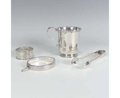 A George VI silver Christening Mug, by&nbsp;Edward Barnard &amp; Sons Ltd., hallmarked London, 1950, plain with scroll handle