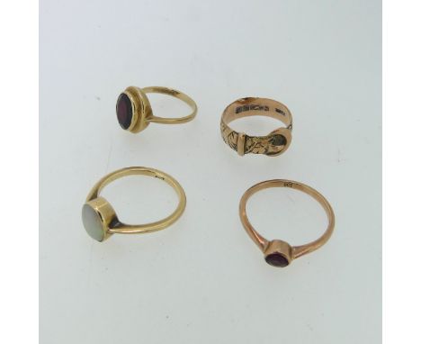 A 9ct rose gold Buckle Ring, Size P, together with an oval opal ring, millegrain set in 9ct gold, Size O, and two garnet ring