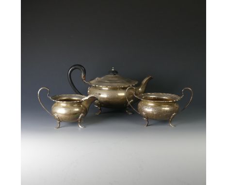 A George V silver three piece Teaset, by&nbsp;Walker &amp; Hall, hallmarked Sheffield, 1929 (the two handled sugar bowl 1928)