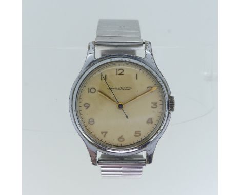 A vintage Jaeger Le-Coultre gentleman's Wristwatch, chrome plated steel case with champagne dial, Arabic numerals, gilt hands