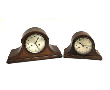 A mahogany mantel clock with barber's pole stringing, 43cmW, together with one other oak domed mantel clock, 30cmW 