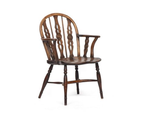 A 19th century ash and elm Windsor armchair, of Prior type, attributable to J &amp; R Prior, Uxbridge, having three pierced s