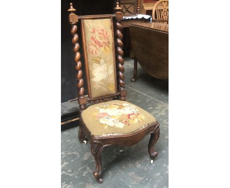 A 19th century walnut slipper chair, back with central grospoint panel, flanked by barleytwist columns, drop-in upholstered s