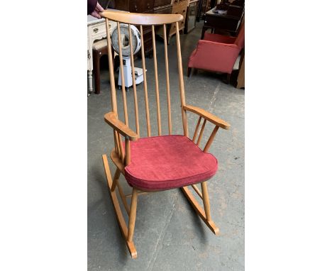 An Ercol style stickback beech rocking chair 
