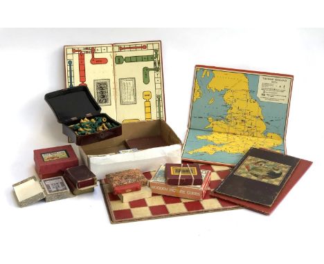 A mixed lot of various toys and games to include vintage playing cards (Waddington); chess pieces; Touring England Geographia