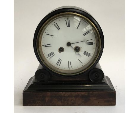 An early 20th century ebonised mantel clock on a simulated burr walnut base, enamel dial, 26cmH 