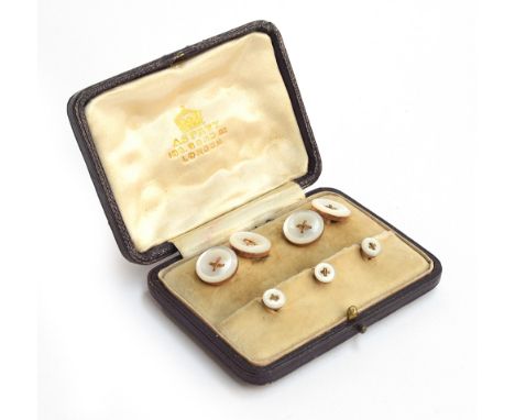 A cased set of Asprey 9ct gold and mother of pearl button style cufflinks and studs, gross weight 8.7g, the leather case mono