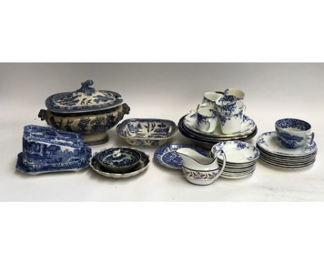 A quantity of 18th century and later blue and white ceramics, to include Spode Italian cheese dish; Willow pattern; hand pain