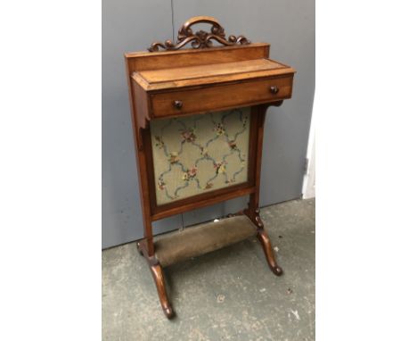 A 19th century mahogany fire screen with single drawer and upholstered foot rest, 45cmW 