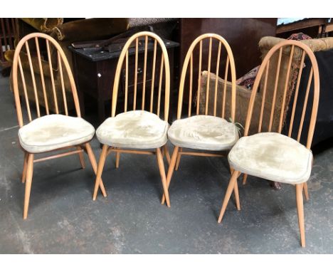 A set of four stickback beech Ercol kitchen chairs