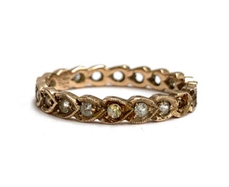 An Art Deco 9ct gold eternity ring, some paste missing, size Q, 2g 