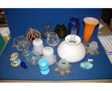 A quantity of glass including; light shades, orange and blue vases, brandy balloon vases, paperweights, fishing float, opaque