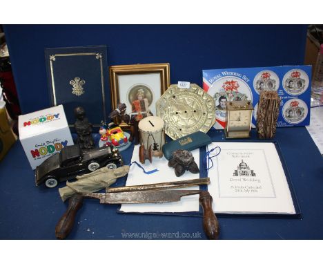 A quantity of miscellanea including brass sundial face, framed postcard, tin drum money box, Noddy figure, soapstone figure (