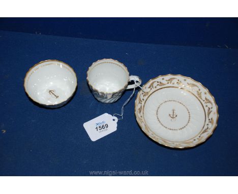 A good Barr Worcester spiral moulded gilt and white trio, with unusual Anchor devise 'Incised' 'B' mark circa 1800.