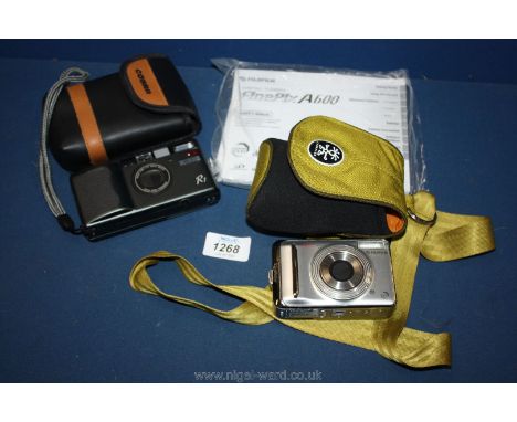 A cased Fujifilm digital camera, a Ricoh R1 digital camera cased, a digital Finepix A600 with instruction booklet.