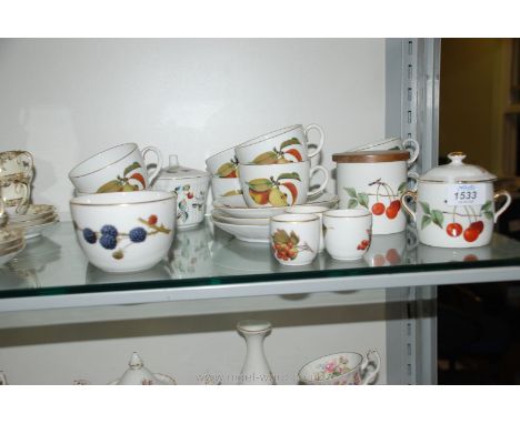 A quantity of Royal Worcester 'Evesham' cups, saucers, egg cups, 'Wild Strawberry' conserve pot etc.
