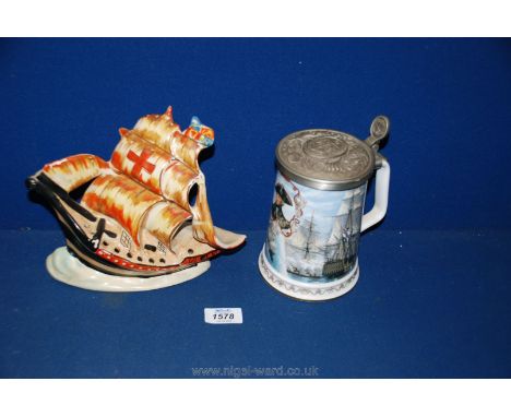 An Arthur Wood model of HMS Nelson and a Royal Worcester National Maritime Museum 50th Anniversary lidded tankard of Lord Nel