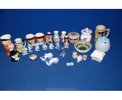 A quantity of miscellaneous china including; Toby jugs, a Poole jam pot and lid, two small Delft clogs, a Rumney Wales saucer