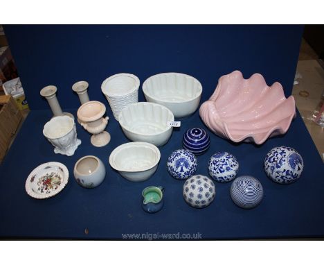 A quantity of china to include; a large shell shaped dish, a Royal Worcester jardiniere (with a crack), jelly moulds, ceramic