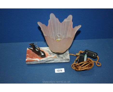 A small marble base Art Deco lamp with a metal deer sitting and a pink lamp shade. 7" tall.
