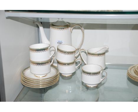 A Royal Albert Coffee set in Kensington pattern to include five cups and saucers, coffee pot, sugar bowl and cream jug, white