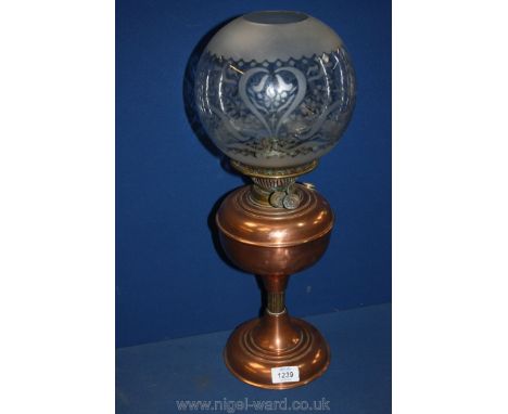 A copper oil Lamp. 19 1/2" tall. (lacking chimney)