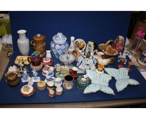 A quantity of china ornaments, vases etc including butterfly wall pockets, Prinknash bud vases, Old Courtware, Chokin etc, so
